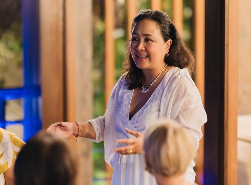 Isa Buencamino speaking with a group of women at a WOW gathering